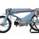 Illustration for article titled This Is What Happens When You Turn A Honda Super Cub Into A Badass Racer